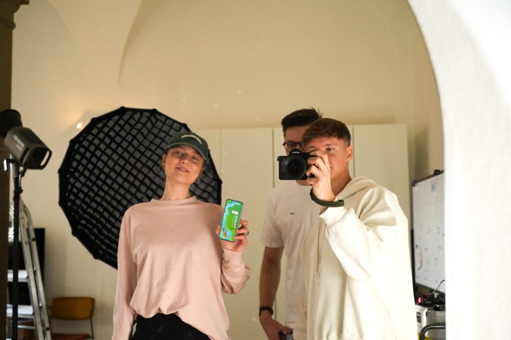 Filming social media content with camera and softbox